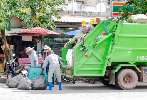 Professionals collecting garden waste in Mayfair